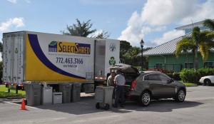 An early participant in the shred event having his confidential documents shredded